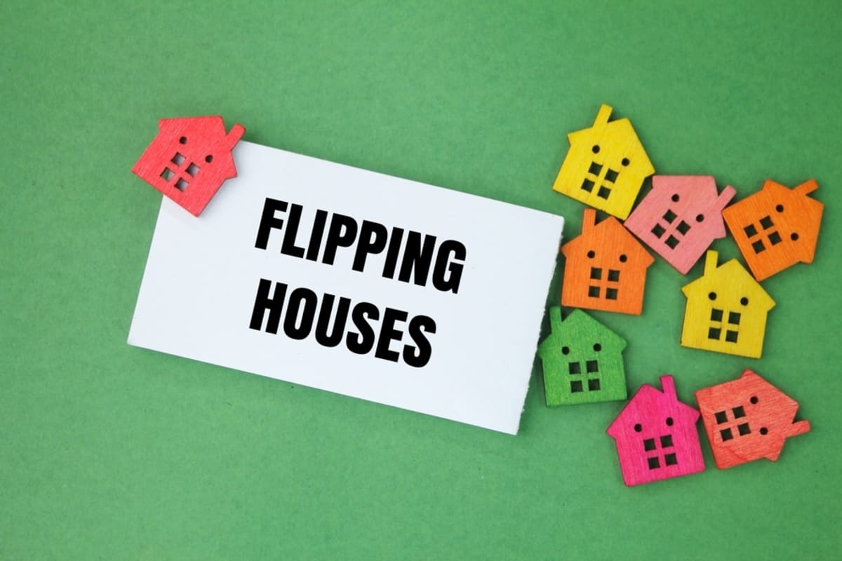 A card that says house flipping