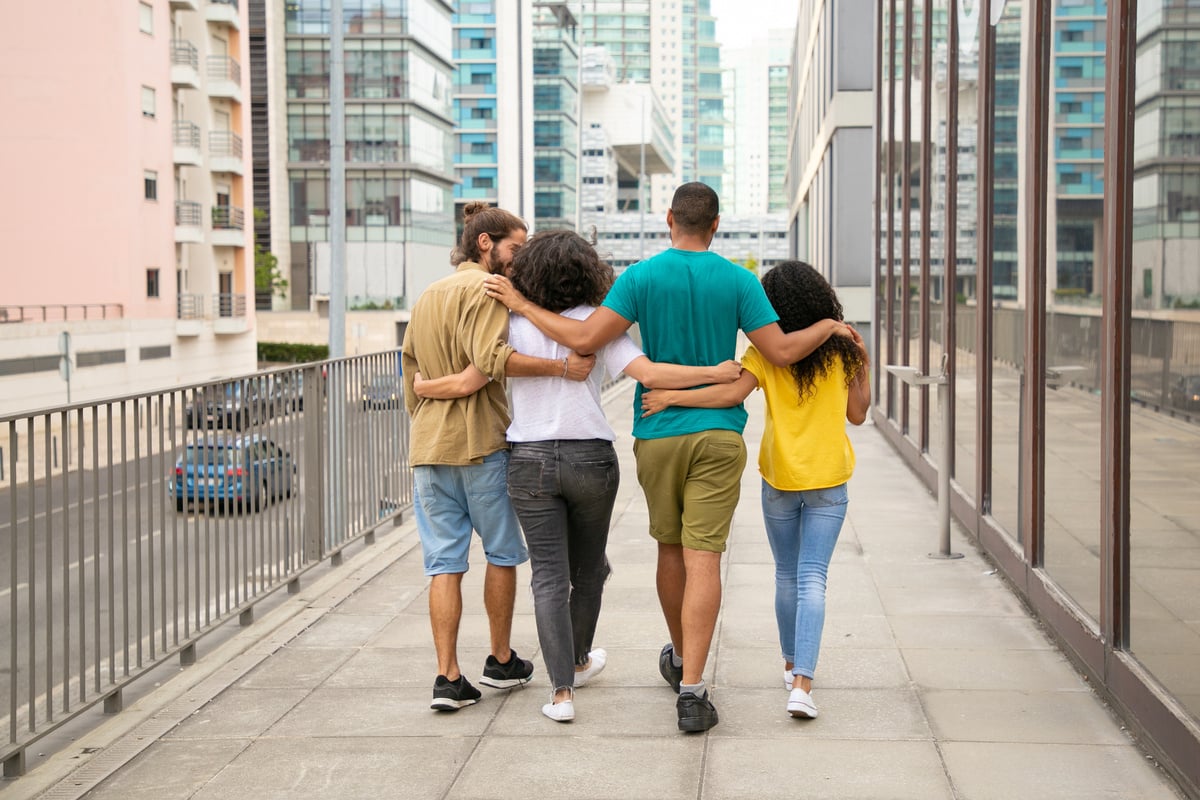 People walking together on a sidewalk